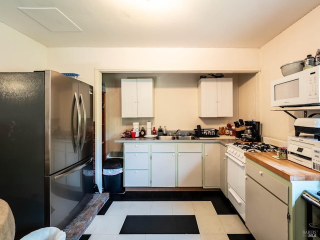 5820 Ruddock Rd N, Philo, CA 95466 - kitchen with white appliances and a sink