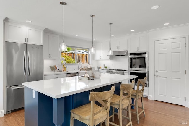 251 Donegal Way, Martinez, CA 94553 - kitchen with stainless steel appliances, a kitchen island, tasteful backsplash, light wood finished floors, and white cabinets