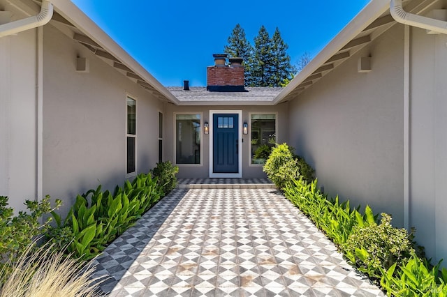 251 Donegal Way, Martinez, CA 94553 - doorway to property featuring stucco siding and a chimney
