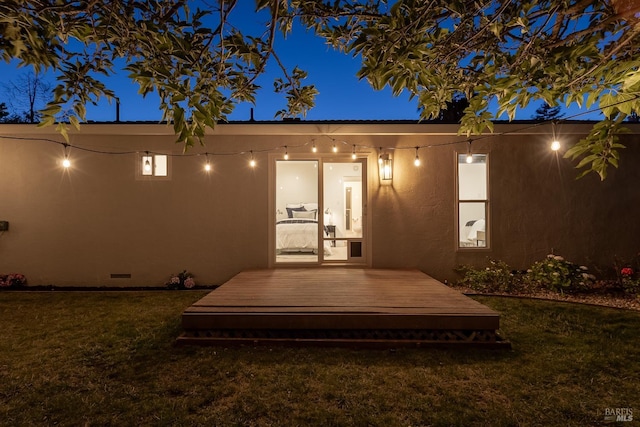 251 Donegal Way, Martinez, CA 94553 - exterior entry at twilight featuring a yard, a deck, stucco siding, and crawl space