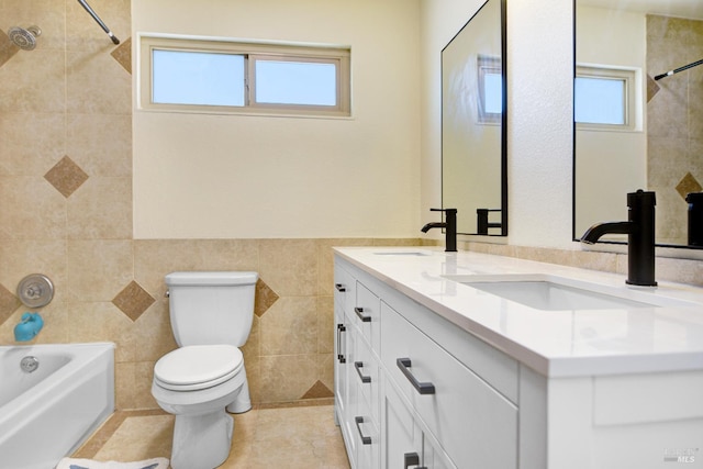 196 Caldwell Dr, Vacaville, CA 95687 - bathroom with double vanity, tile walls, shower / tub combination, plenty of natural light, and tile patterned floors