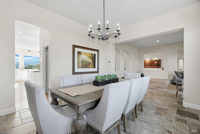 5313 Autumn Rock Ct, Fairfield, CA 94534 - dining room featuring stone tile floors, a chandelier, and recessed lighting