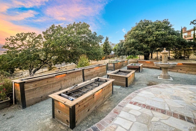 5313 Autumn Rock Ct, Fairfield, CA 94534 - patio terrace at dusk with a vegetable garden