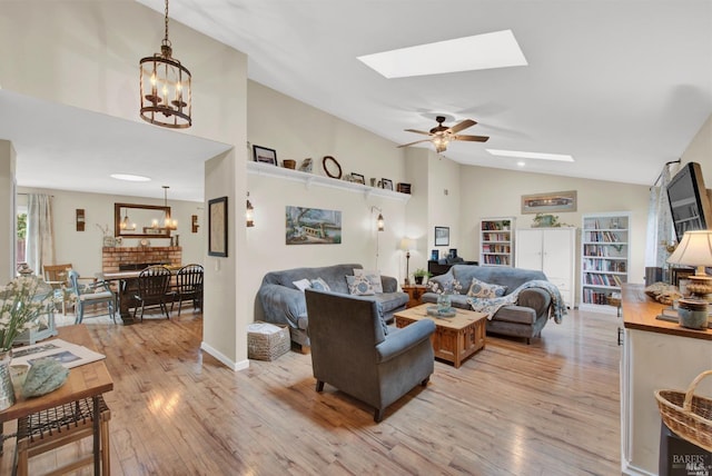 2783 Vista Palomar, Fairfield, CA 94534 - living area with a skylight, light wood-style floors, a ceiling fan, a chandelier, and high vaulted ceiling