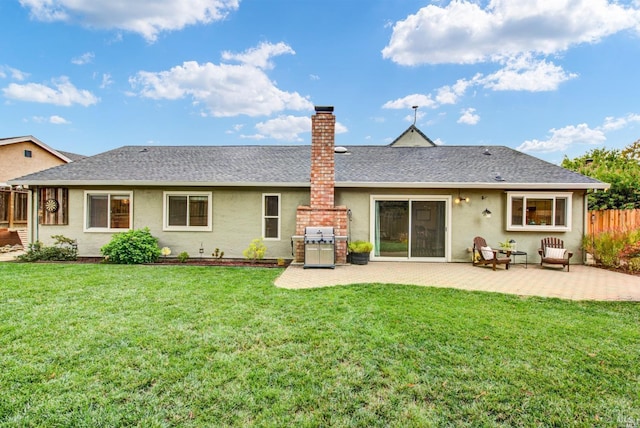 2783 Vista Palomar, Fairfield, CA 94534 - back of house with stucco siding, a patio, a chimney, and a shingled roof