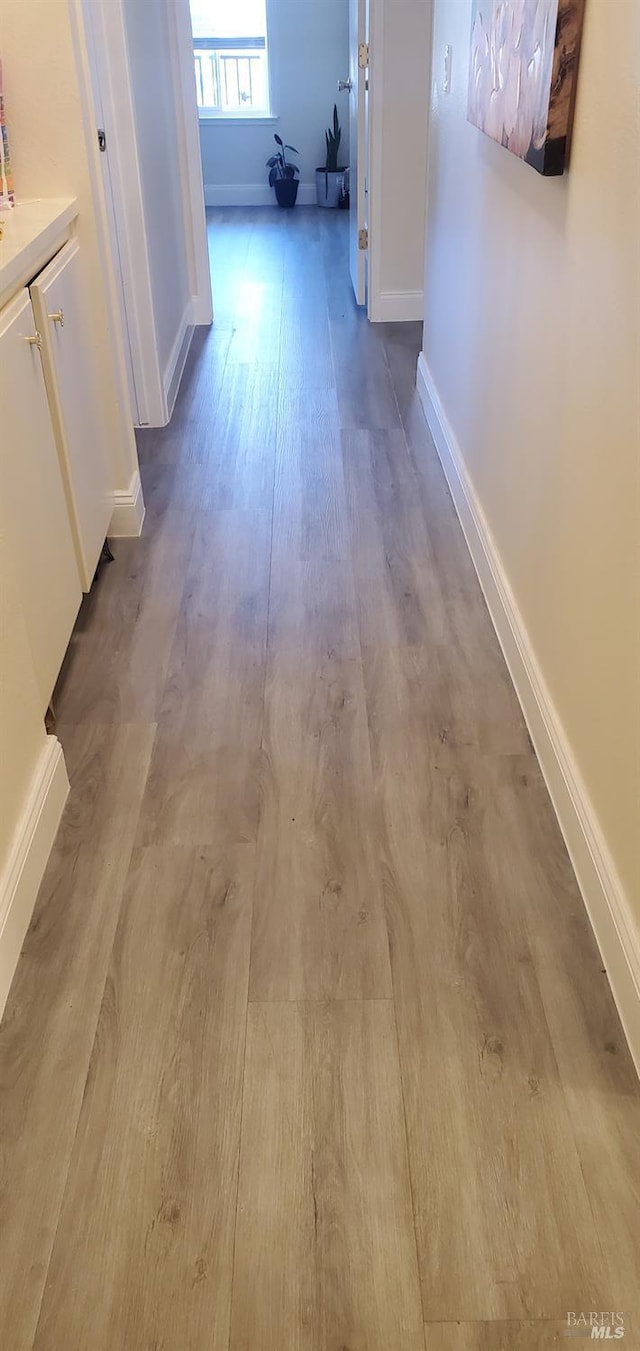 3418 Astoria Ct, Fairfield, CA 94534 - corridor with wood finished floors and baseboards
