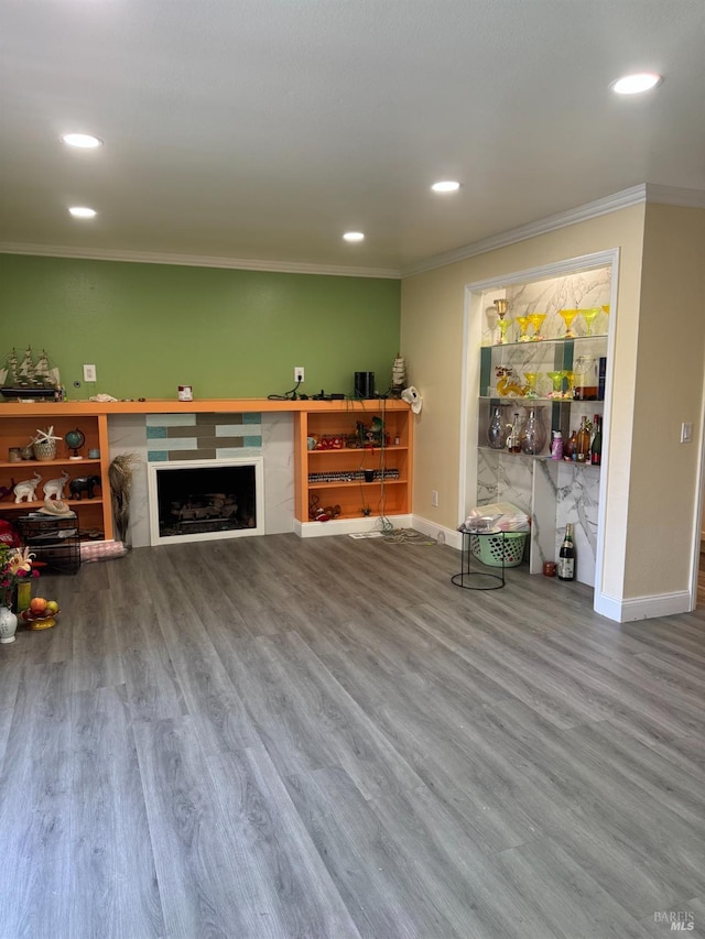 3418 Astoria Ct, Fairfield, CA 94534 - living room with crown molding, wood finished floors, recessed lighting, and a tile fireplace