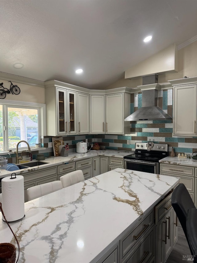 3418 Astoria Ct, Fairfield, CA 94534 - kitchen featuring wall chimney exhaust hood, stainless steel electric stove, tasteful backsplash, crown molding, and light stone counters
