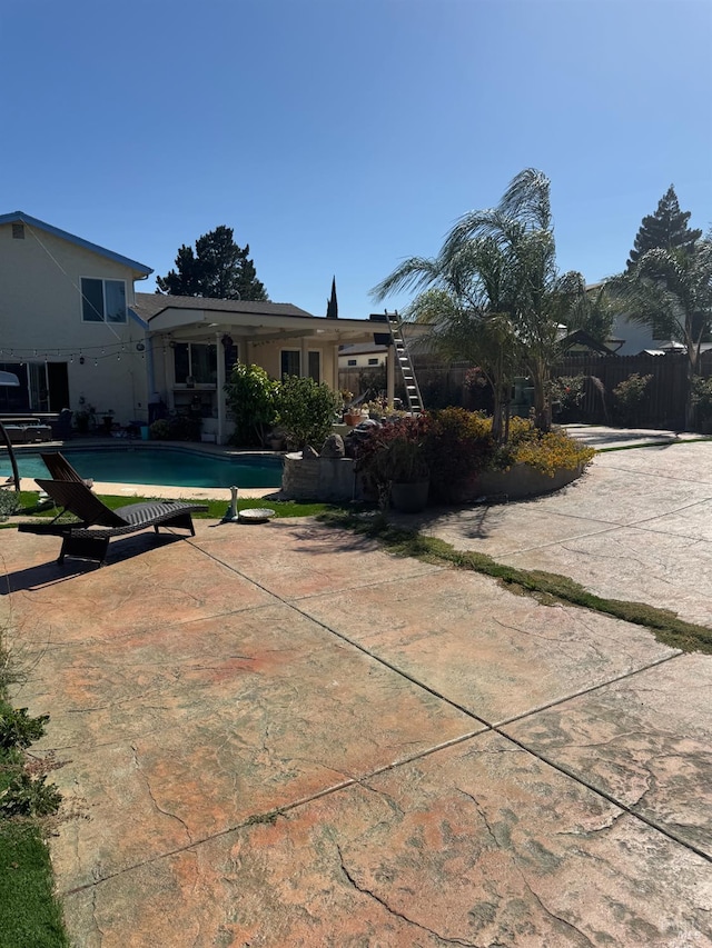 3418 Astoria Ct, Fairfield, CA 94534 - rear view of house featuring an outdoor pool and a patio area