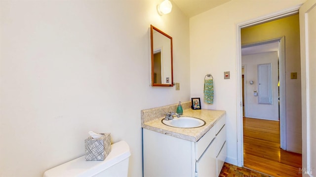 312 12th St, Petaluma, CA 94954 - half bathroom featuring vanity and wood finished floors