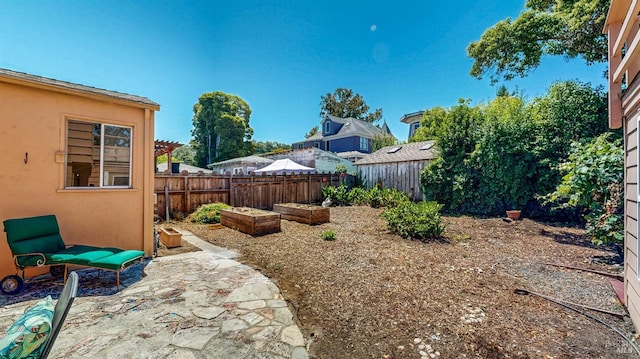 312 12th St, Petaluma, CA 94954 - fenced backyard featuring a patio and a garden