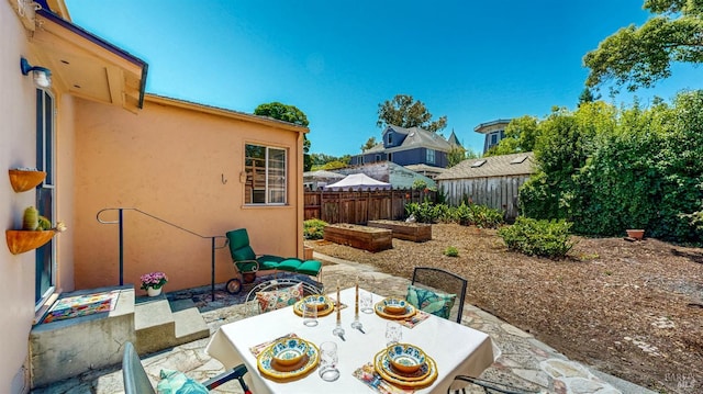 312 12th St, Petaluma, CA 94954 - fenced backyard with a patio and outdoor dining space