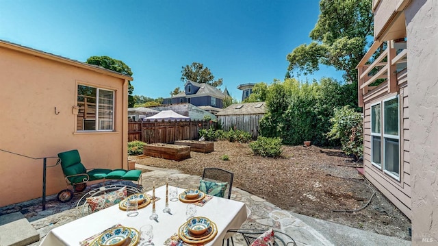 312 12th St, Petaluma, CA 94954 - fenced backyard featuring a patio and outdoor dining space