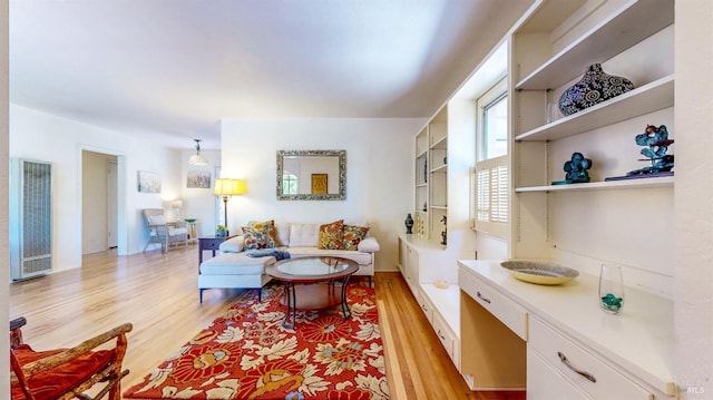 312 12th St, Petaluma, CA 94954 - living area with a heating unit and light wood-type flooring