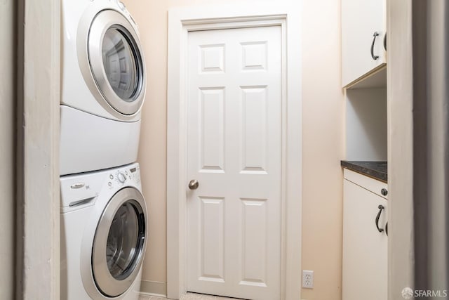 205 Cypress Ave, San Bruno, CA 94066 - laundry area with stacked washer and clothes dryer and cabinet space