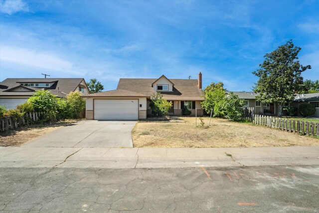 9912 Zion Way, Sacramento, CA 95827 - view of front of home with a garage and concrete driveway