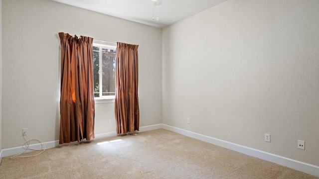 2077 Bourbon St, Pollock Pines, CA 95726 - unfurnished room with light colored carpet and a ceiling fan
