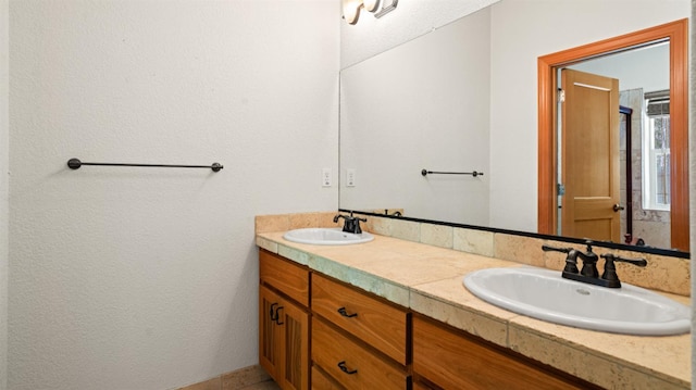 2077 Bourbon St, Pollock Pines, CA 95726 - full bathroom featuring double vanity and a textured wall