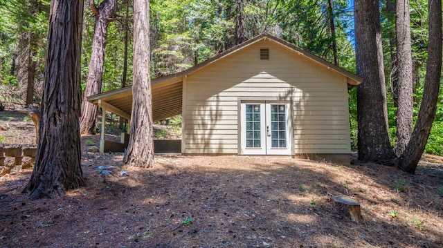 2077 Bourbon St, Pollock Pines, CA 95726 - view of side of home featuring french doors