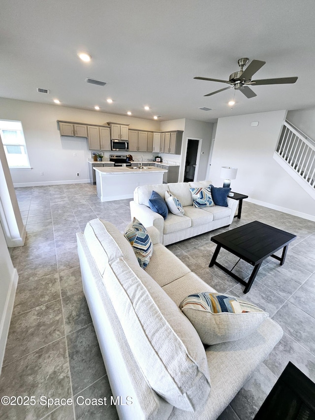 living room with ceiling fan