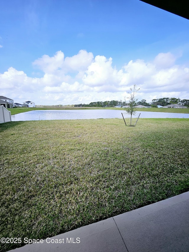 view of yard with a water view