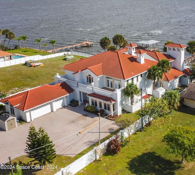 drone / aerial view with a water view