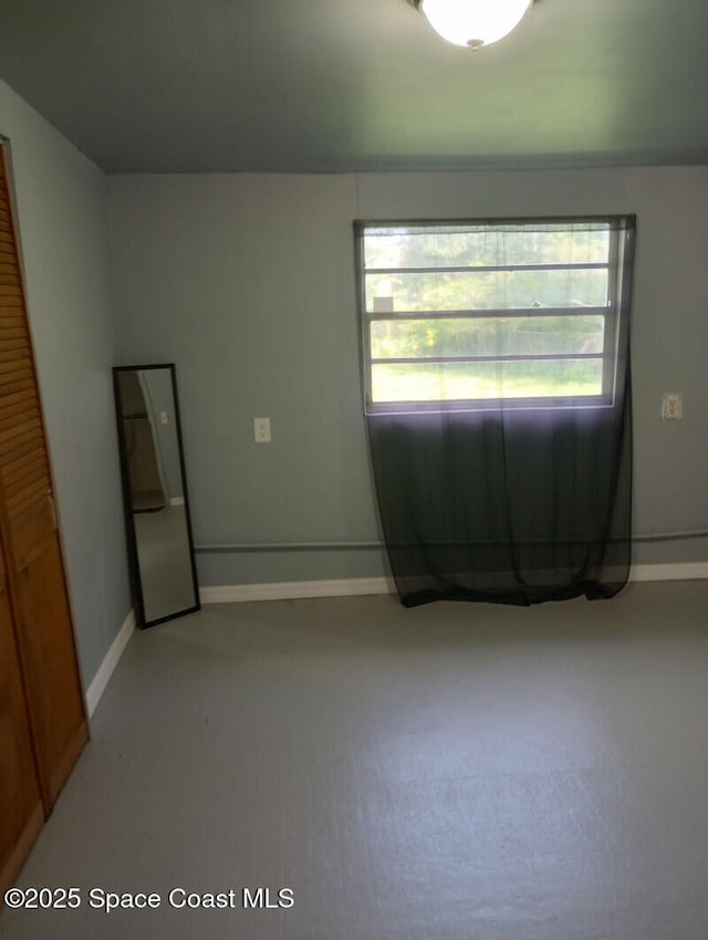 2430 Legay St, Cocoa, FL 32926 - spare room with plenty of natural light and light carpet