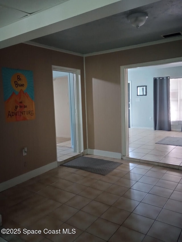 2430 Legay St, Cocoa, FL 32926 - tiled empty room with ornamental molding and baseboards