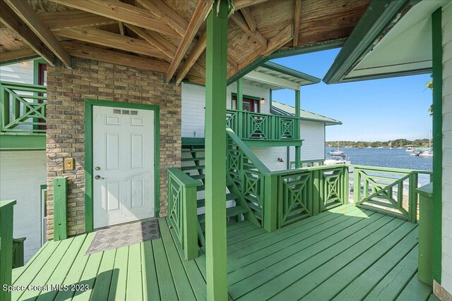 deck featuring a water view