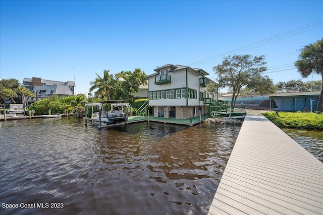 dock area featuring a water view