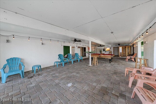 view of patio / terrace featuring ceiling fan