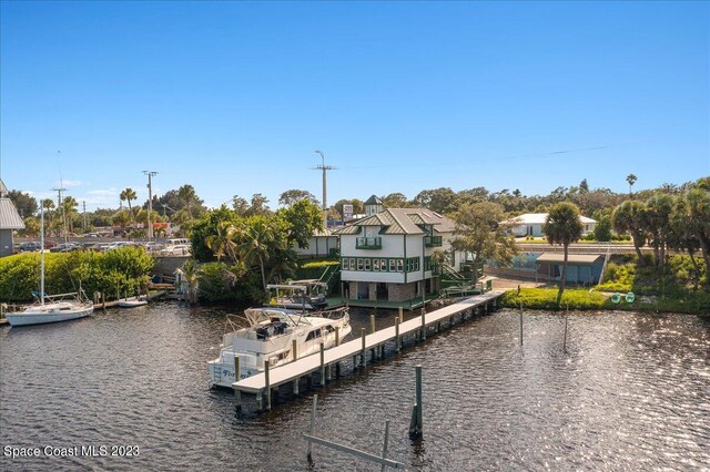 dock area with a water view