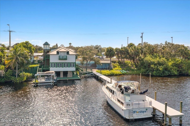 dock area featuring a water view