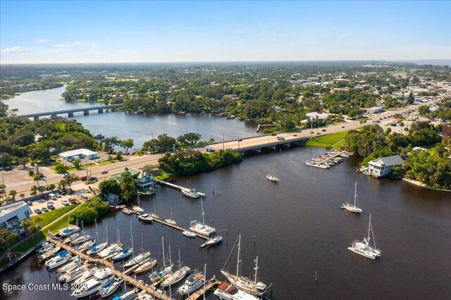 drone / aerial view featuring a water view