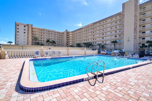 view of pool with a patio