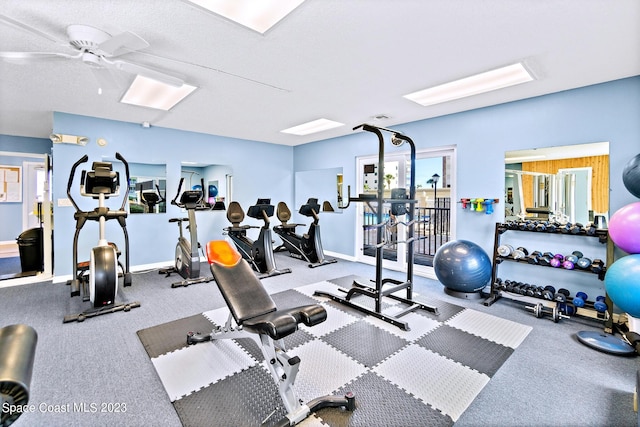 workout area with carpet floors and ceiling fan