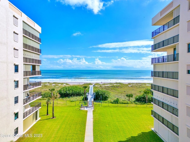 view of water feature with a beach view