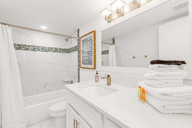 full bathroom featuring toilet, shower / bath combo, oversized vanity, and tile flooring