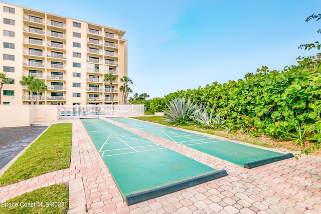 view of home's community featuring a swimming pool