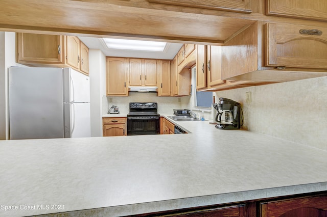 kitchen with black electric range, light brown cabinetry, sink, and white refrigerator