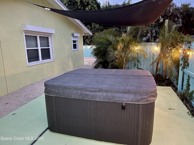 view of patio featuring a hot tub