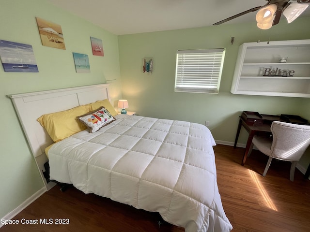 bedroom with wood-type flooring and ceiling fan