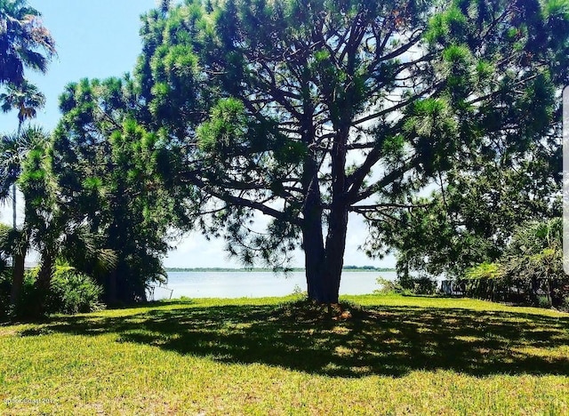 exterior space with a water view