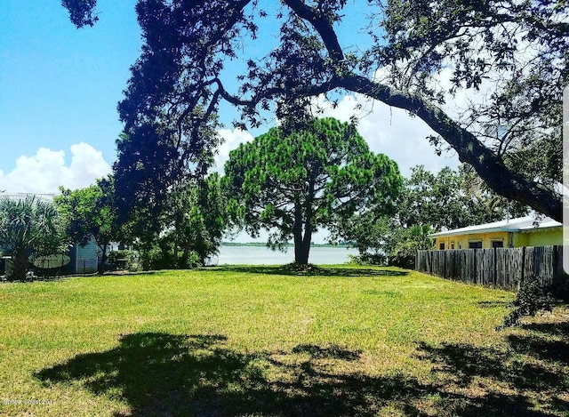 view of yard with a water view