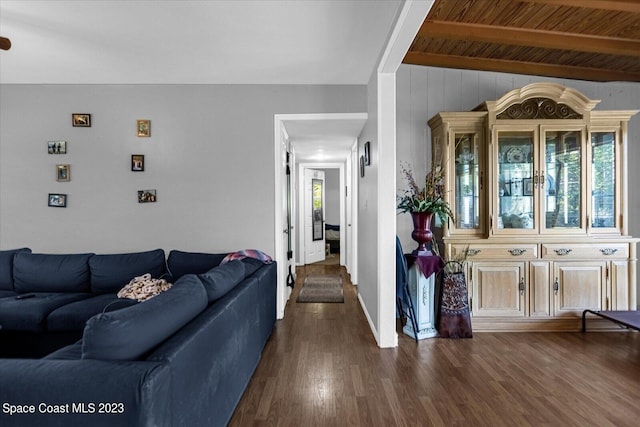 3706 Sutton Dr, Orlando, FL 32810 - living room with wood ceiling, dark hardwood / wood-style flooring, and vaulted ceiling with beams