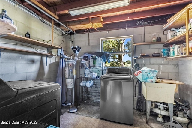 3706 Sutton Dr, Orlando, FL 32810 - interior space featuring washer / clothes dryer and electric water heater