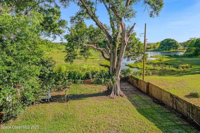 3706 Sutton Dr, Orlando, FL 32810 - view of yard with a water view