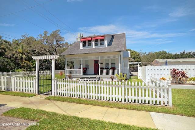 view of front of home featuring a porch and a front lawn