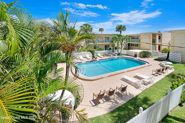 view of pool featuring a patio