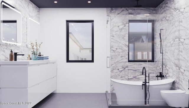 bathroom with tile flooring, toilet, and tile walls